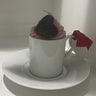 Pink Coffee with cream in ceramic cup Candle