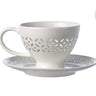 Cups and saucers pierced set 4
